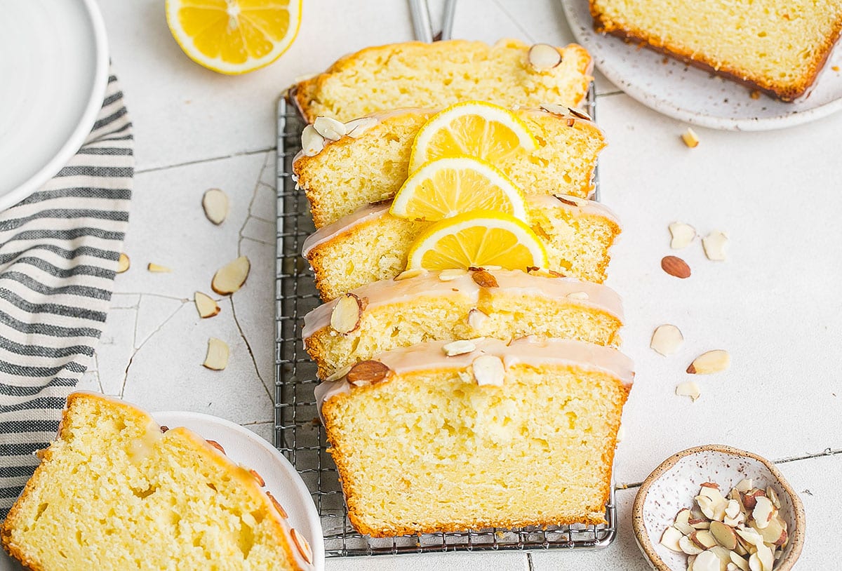 angled shot of sliced almond lemon cake