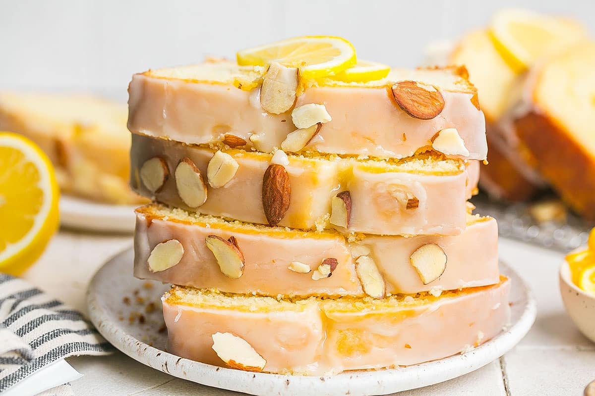 straight on shot of stack of almond lemon cake slices