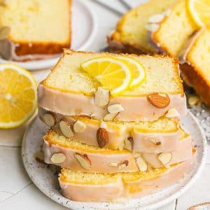 angled shot of stack of sliced lemon loaf cake