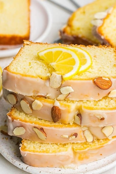 angled shot of stack of sliced lemon loaf cake