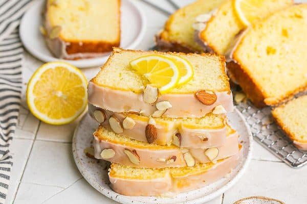 angled shot of stack of sliced lemon loaf cake