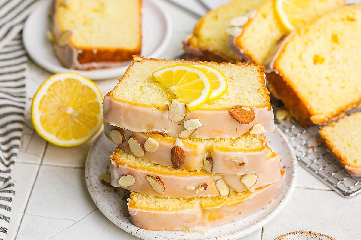 angled shot of stack of sliced lemon loaf cake