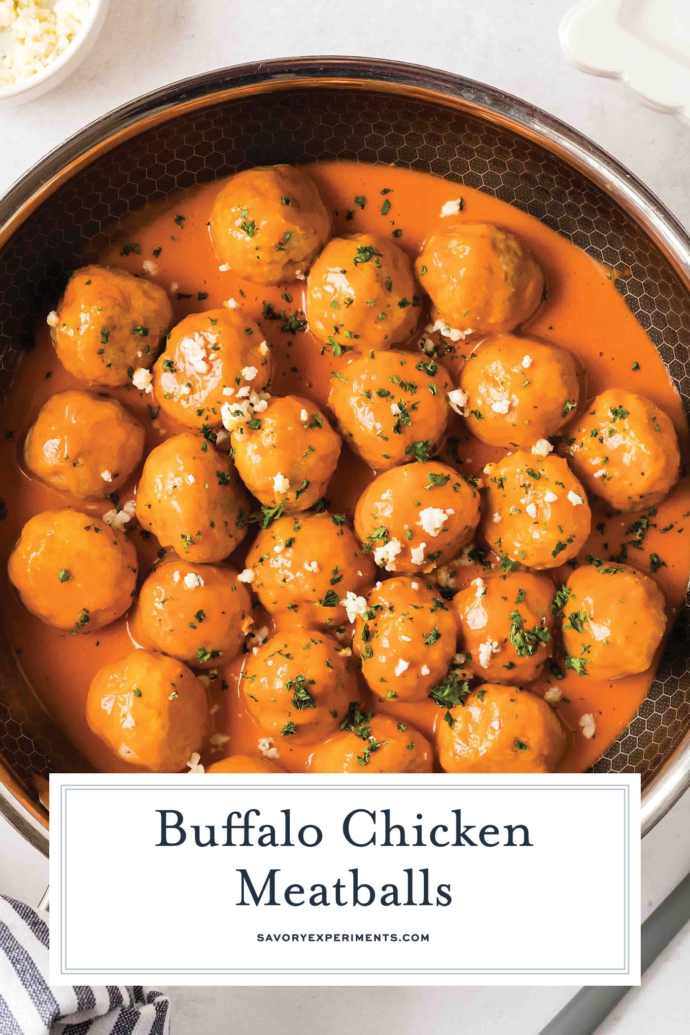 overhead shot of buffalo chicken meatballs in a pan with text overlay for pitnerest