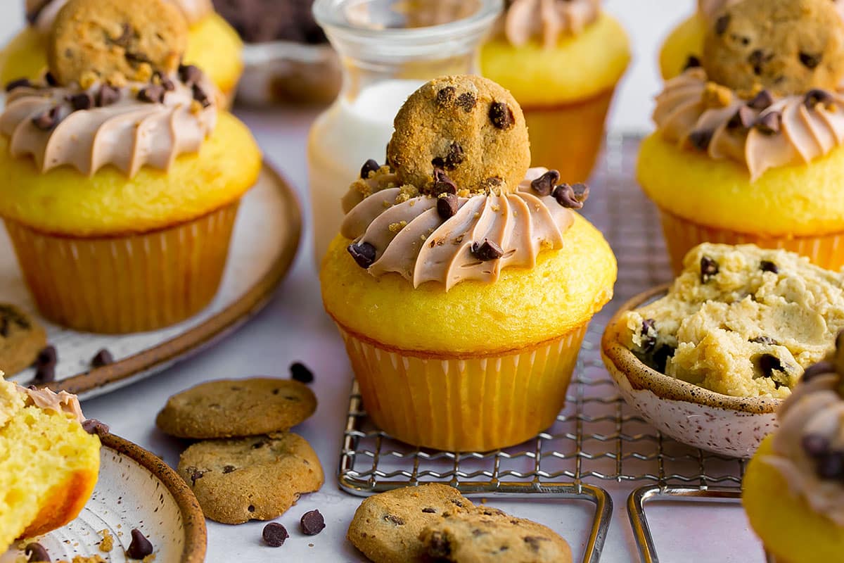 stuffed cookie dough cupcake on a cooling rack