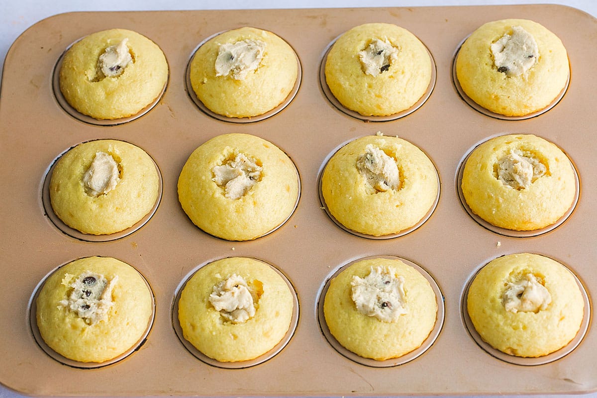 cookie dough stuffed into baked cupcakes