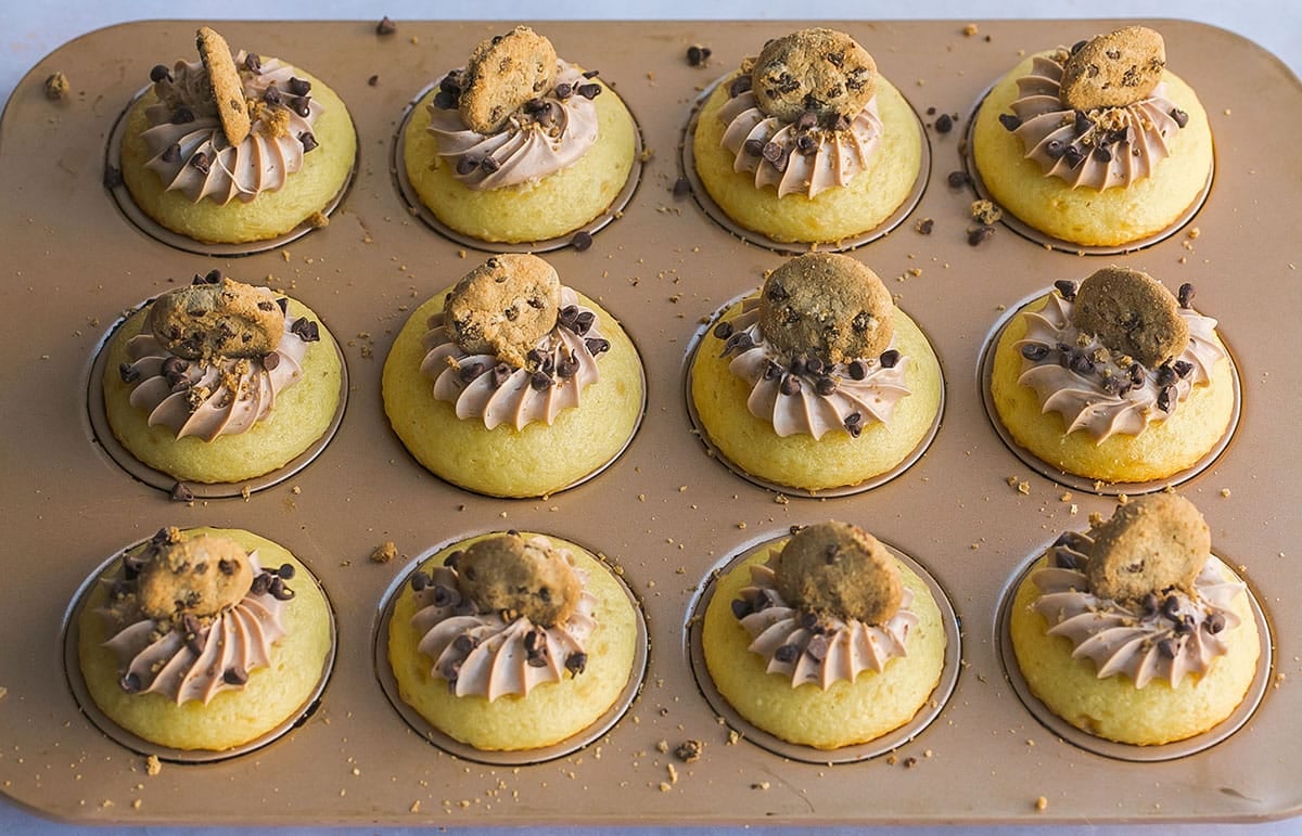 stuffed cookie dough cupcakes in a cupcake pan