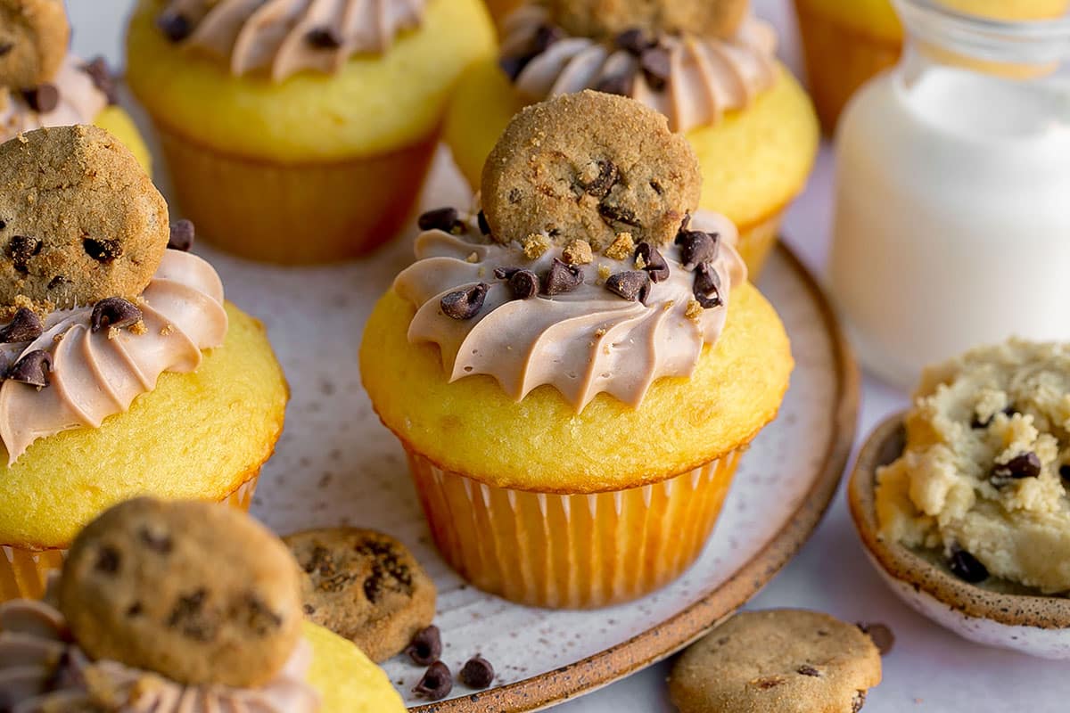 close up of cookie dough cupcakes on a plate