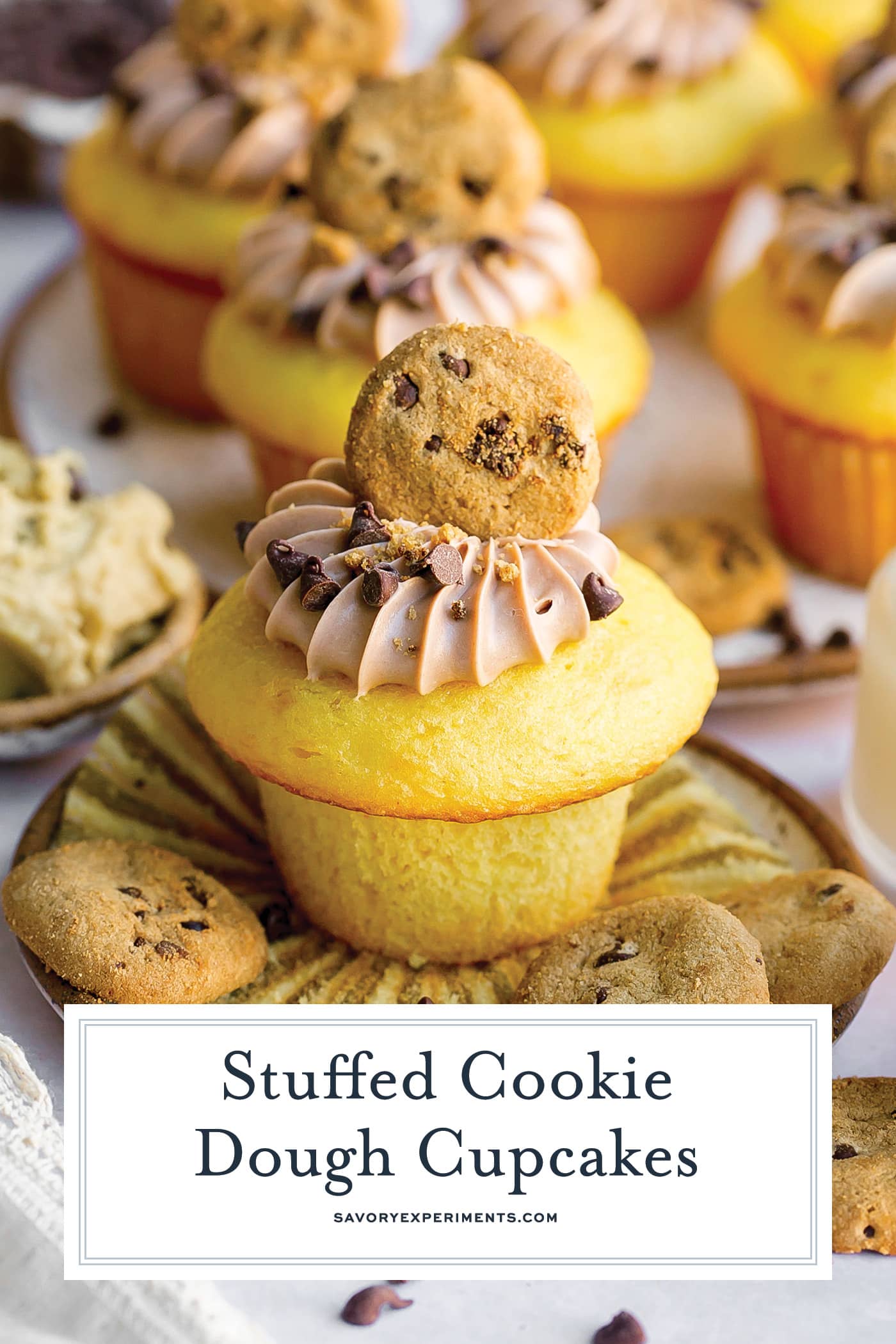 stuffed cookie dough cupcake with text overlay for pinterest