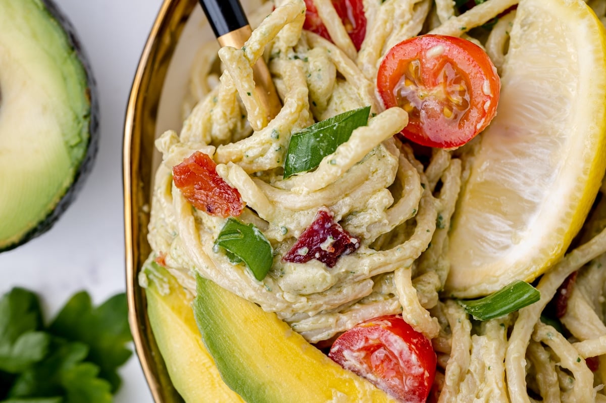 close up of twirl of pasta on a fork