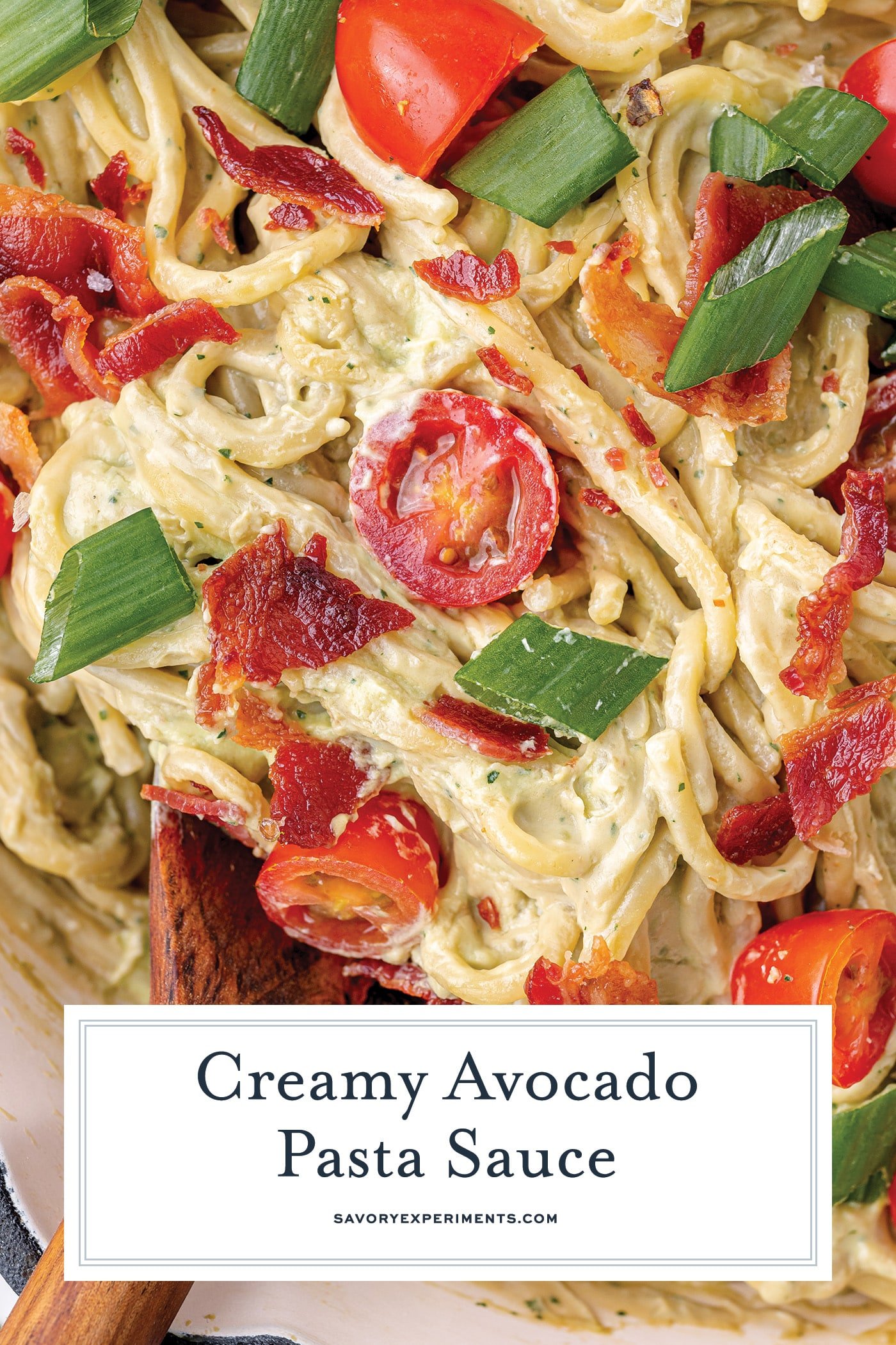 close up of creamy pasta sauce with text overlay for pinterest