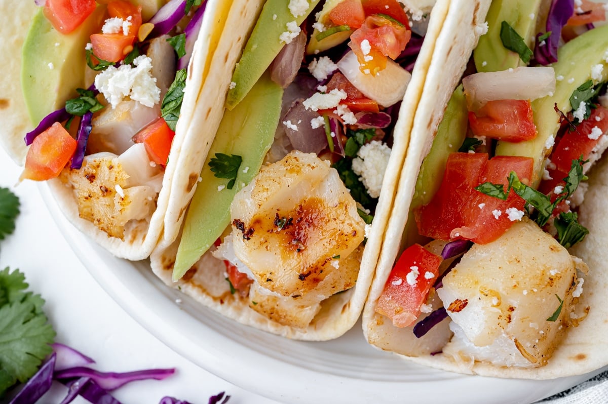 close up of fish tacos on a plate