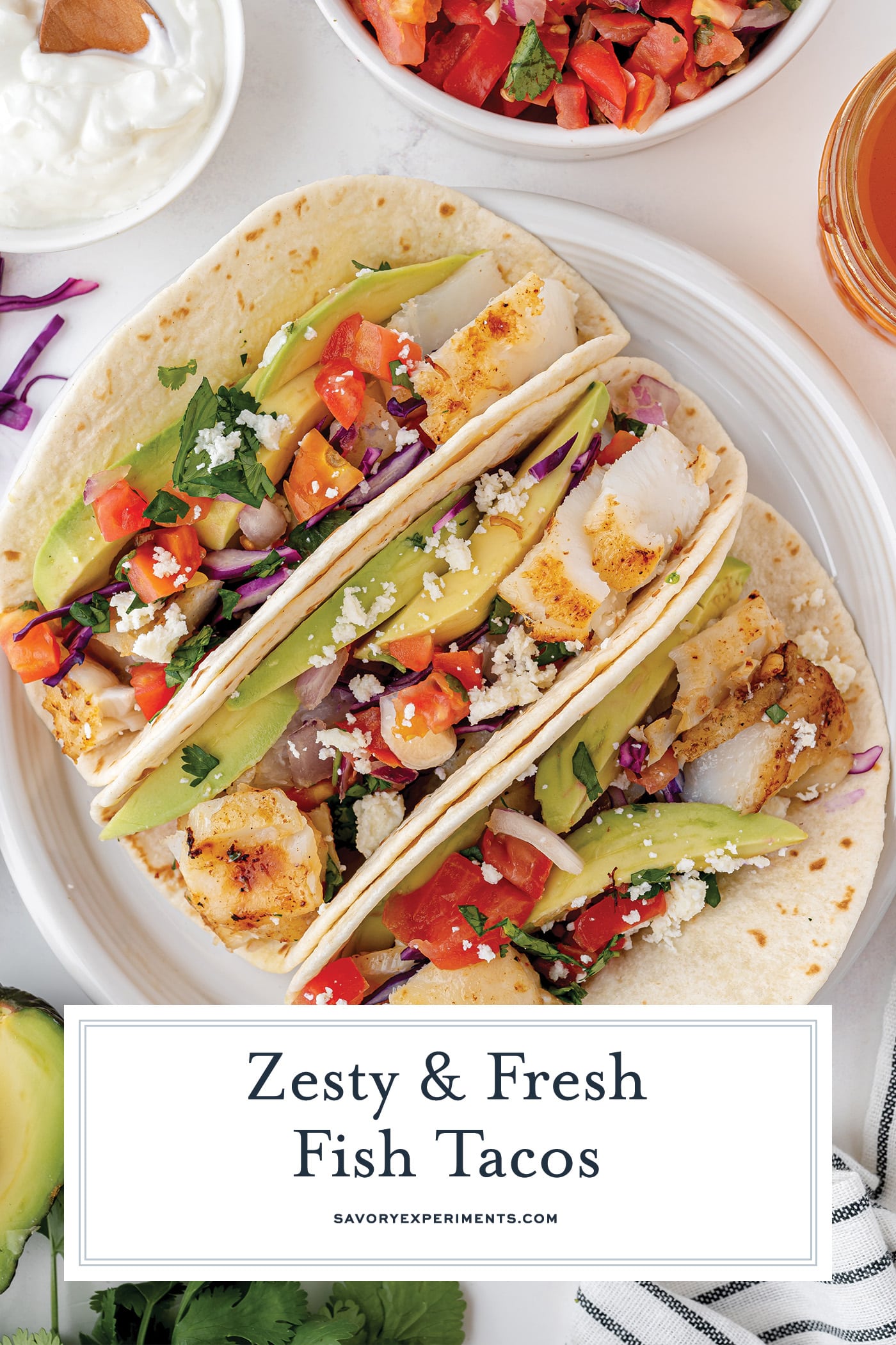 three fish tacos on a plate with text overlay for pinterest