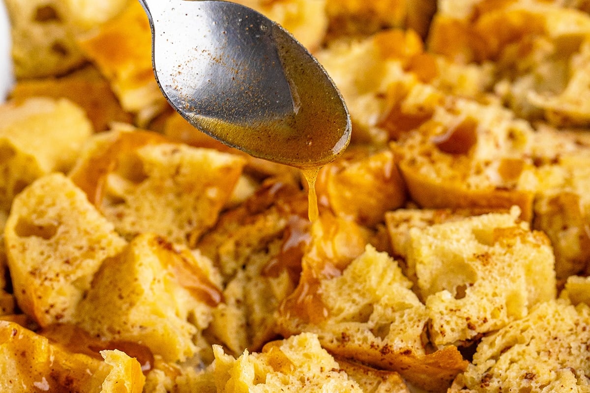 cinnamon mixture spooned onto french toast casserole