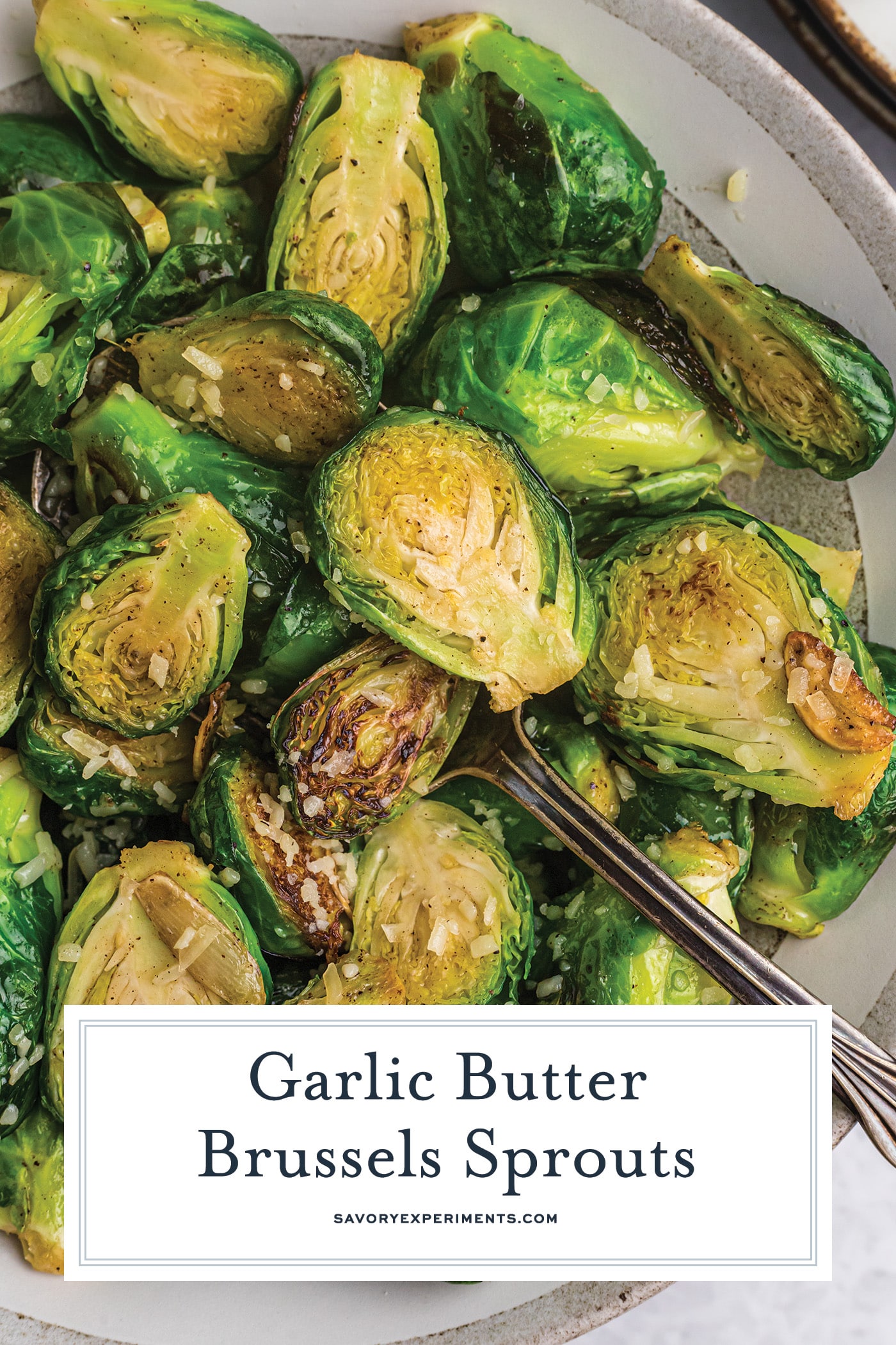 overhead shot of bowl of garlic butter brussels sprouts with text overlay for pinterest
