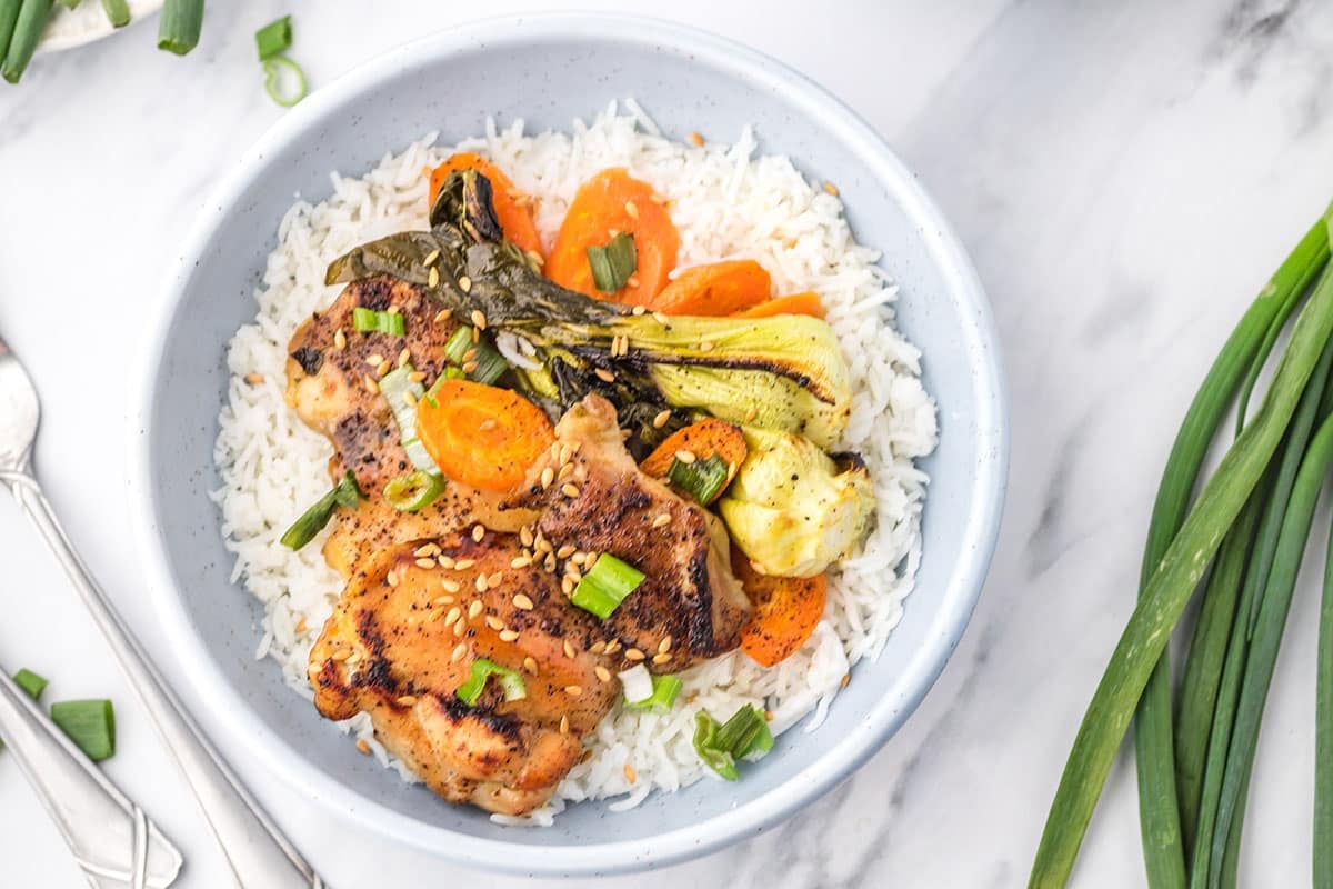 overhead shot of honey garlic chicken in bowl