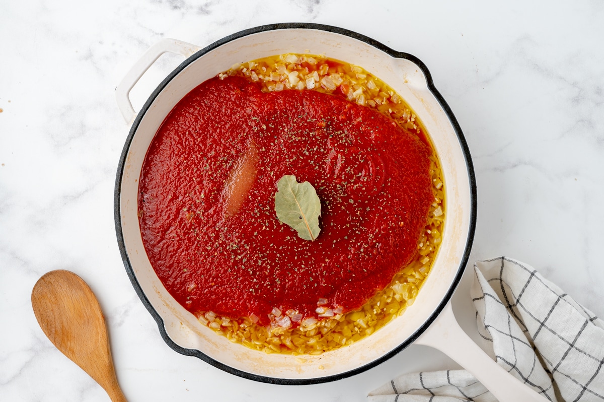 making simple meatball sauce in cast iron skillet