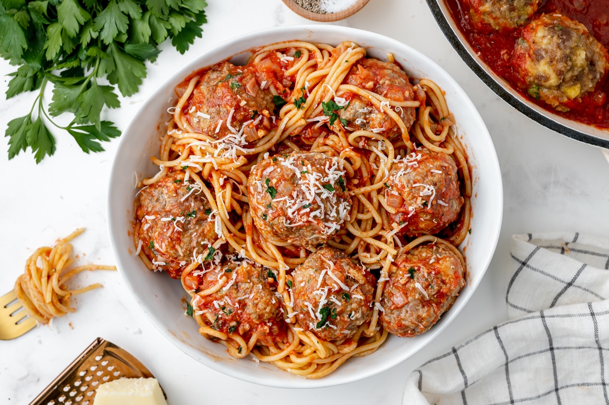 spaghetti and meatballs in a large pasta bowl