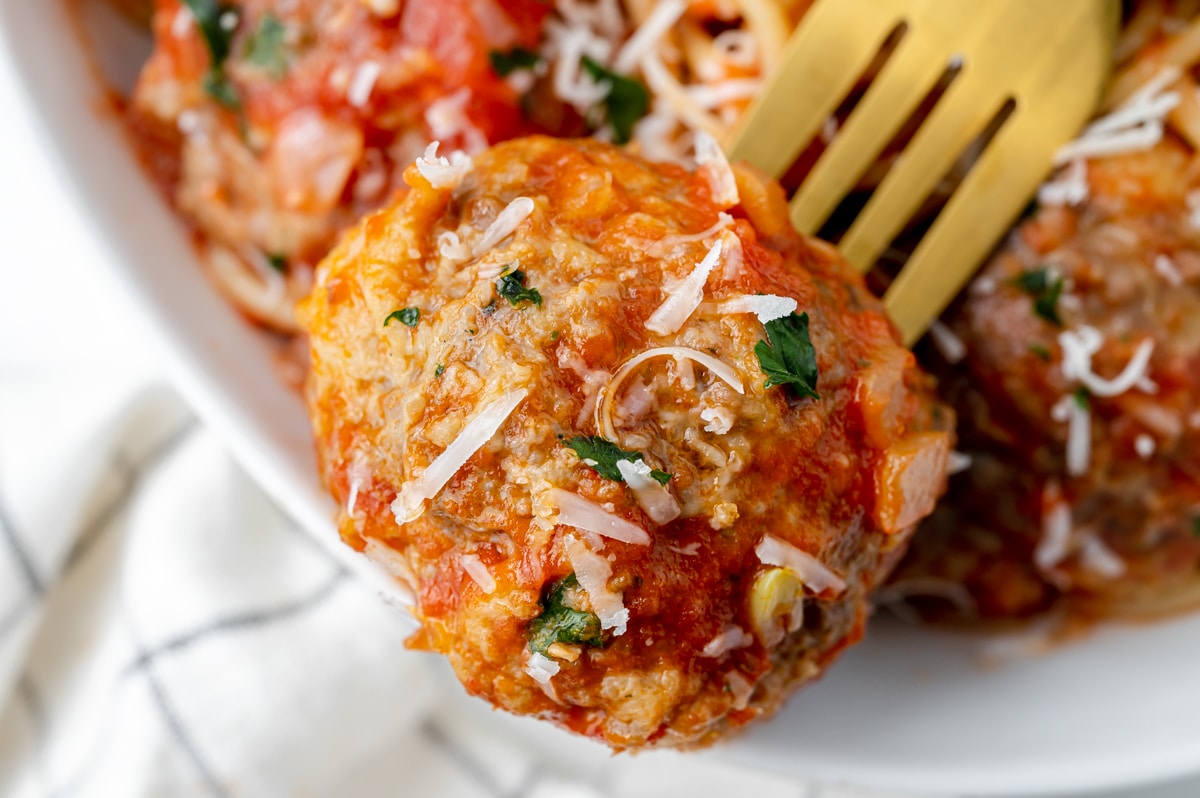 large homemade meatball on a fork