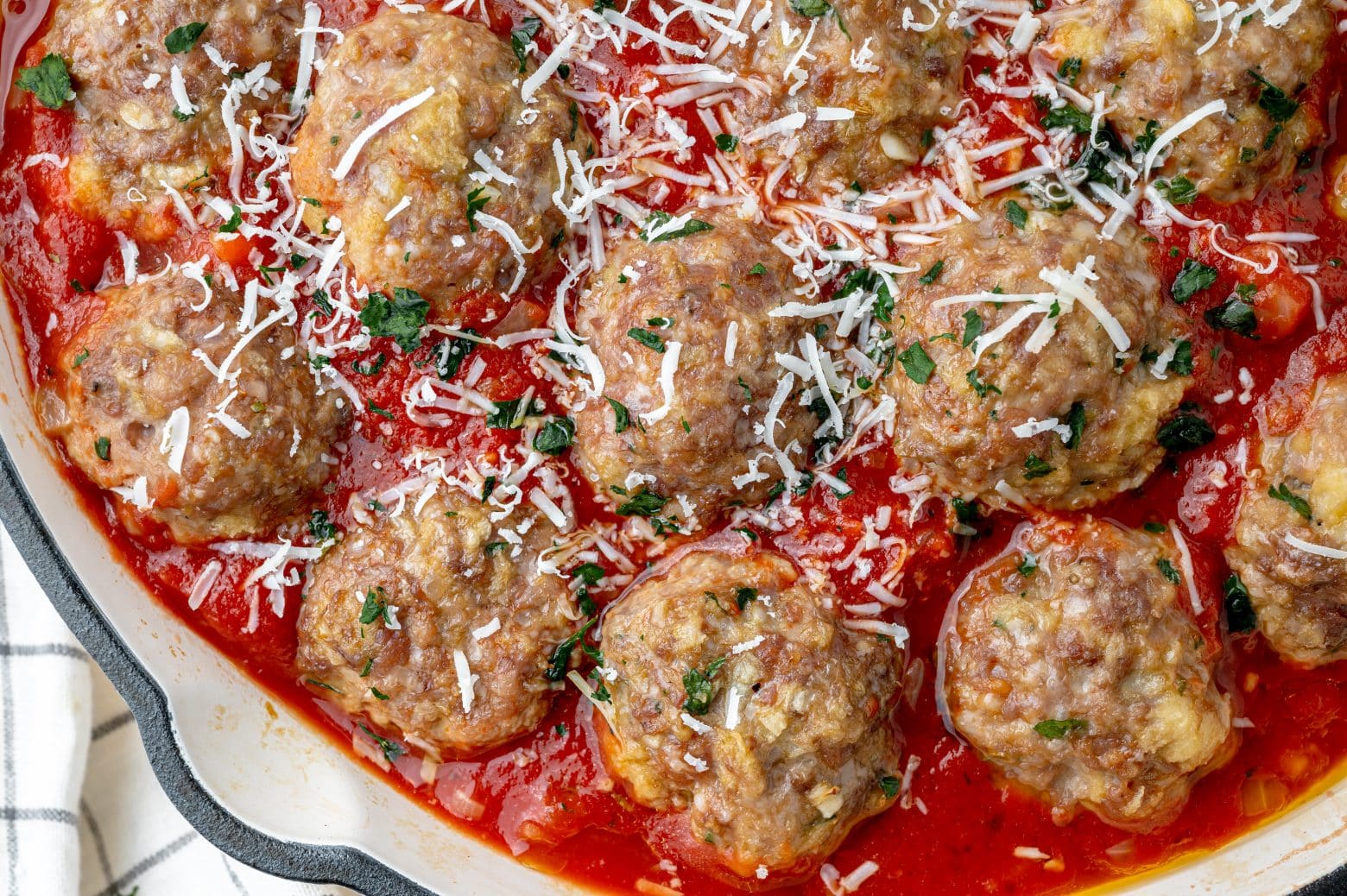 close up of meatballs in sauce