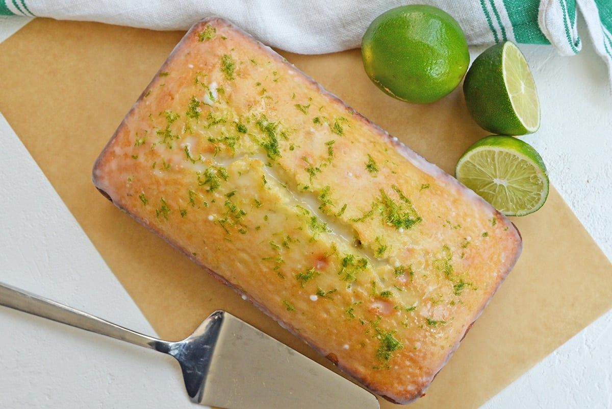 overhead shot of pound cake with limes