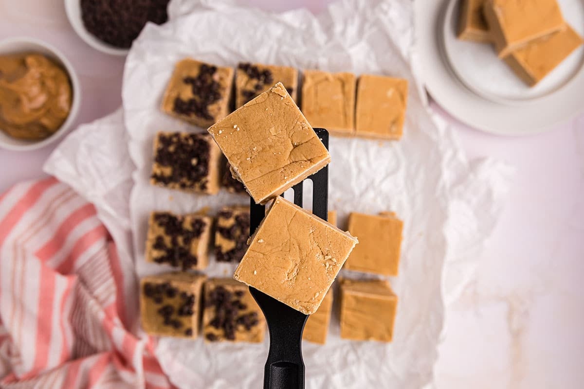 overhead shot of two pieces of fudge on a spatula