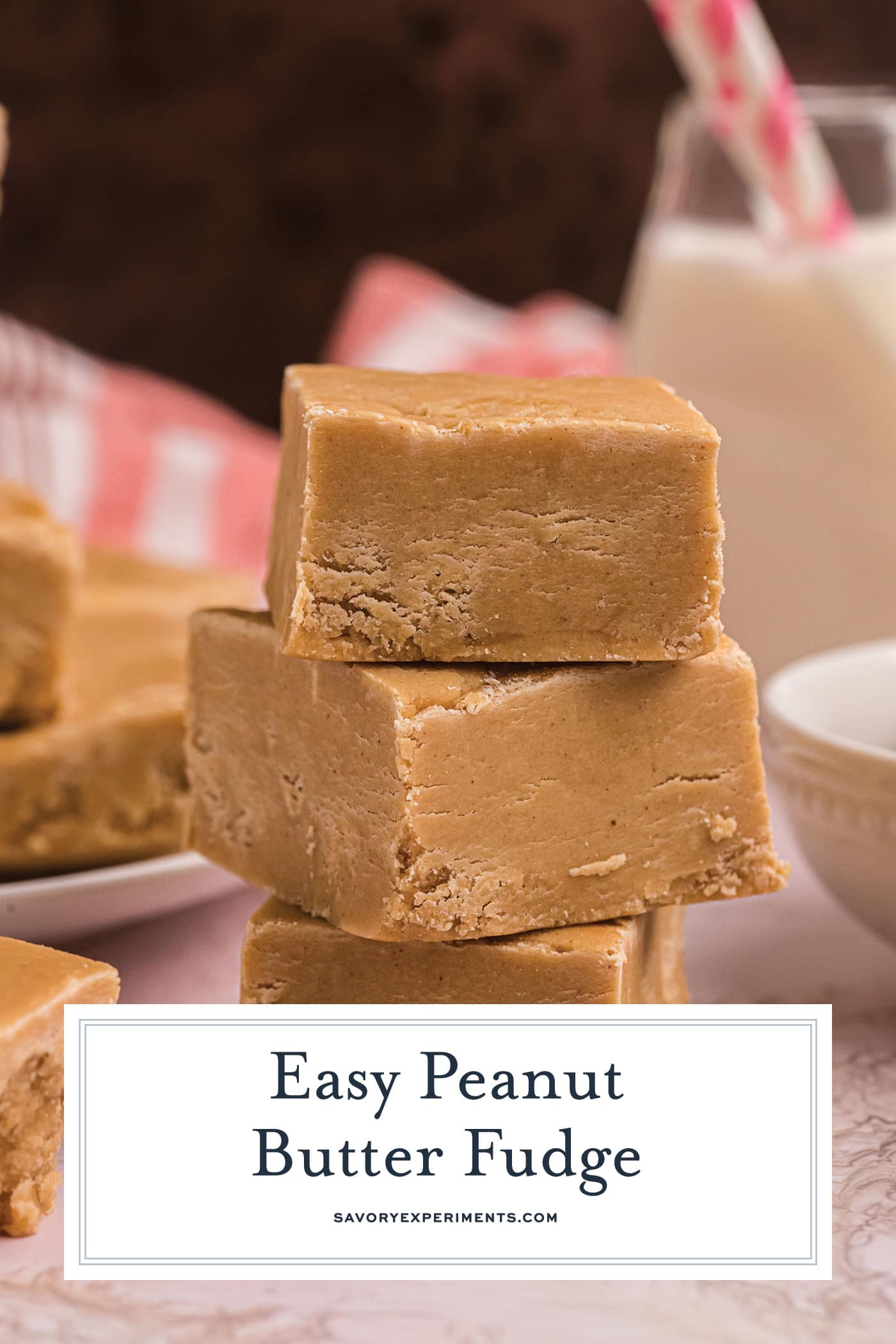 stack of peanut butter fudge with text overlay for pinterest