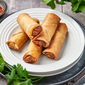 pile of spring rolls on a plate