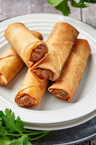 pile of spring rolls on a plate