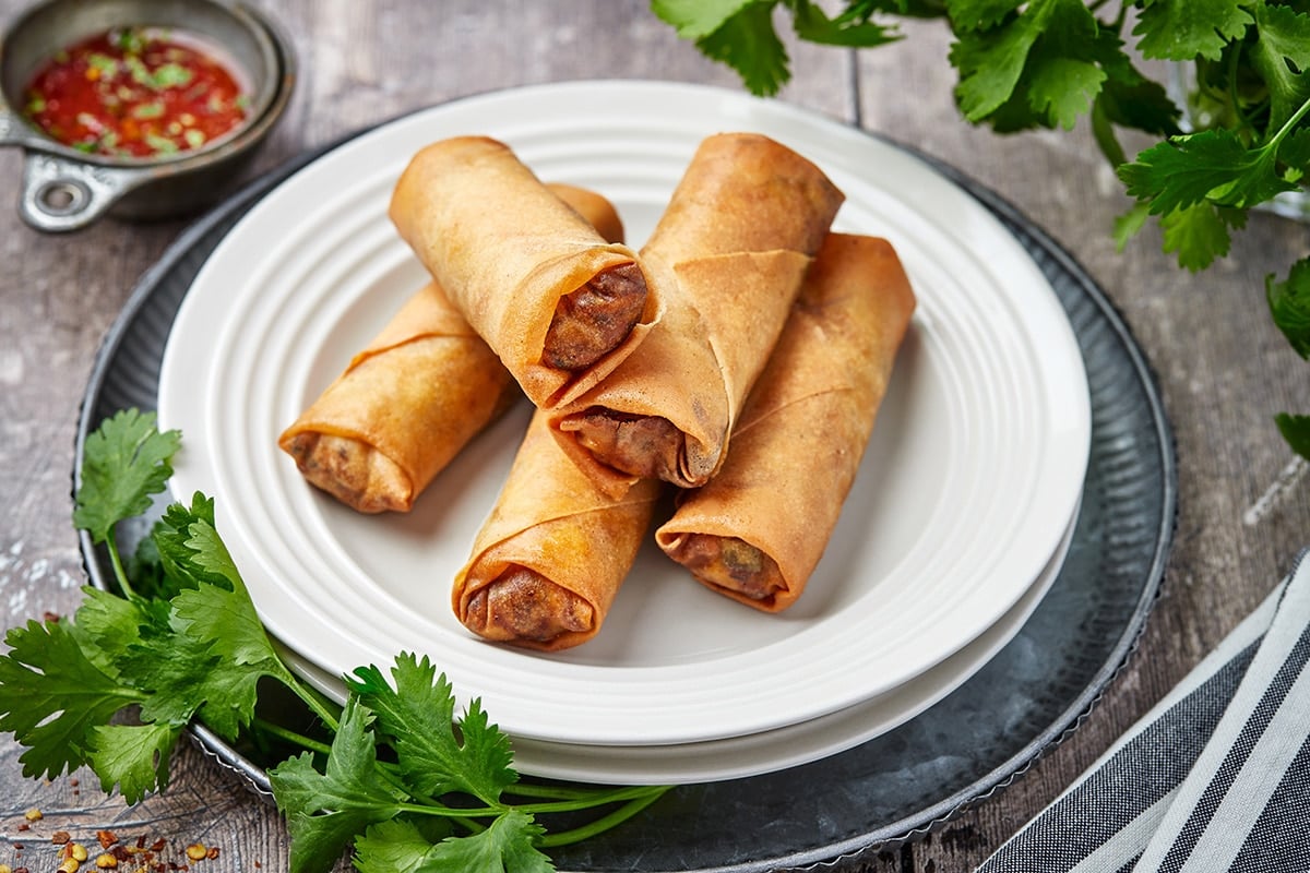 pile of spring rolls on a plate