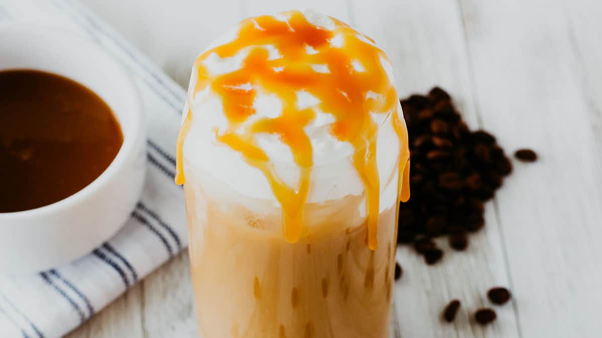 caramel drizzle on top of a starbucks white chocolate mocha