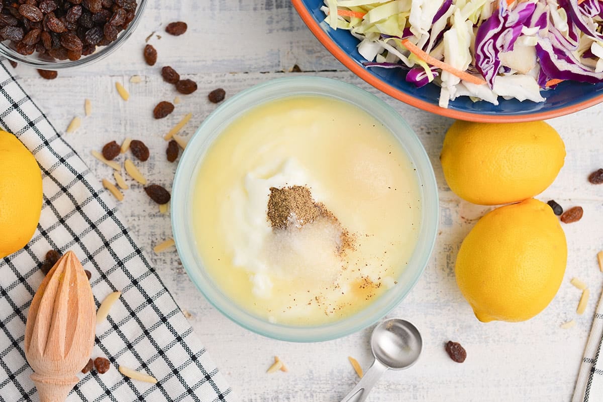 overhead shot of coleslaw dressing ingredients in a bowl