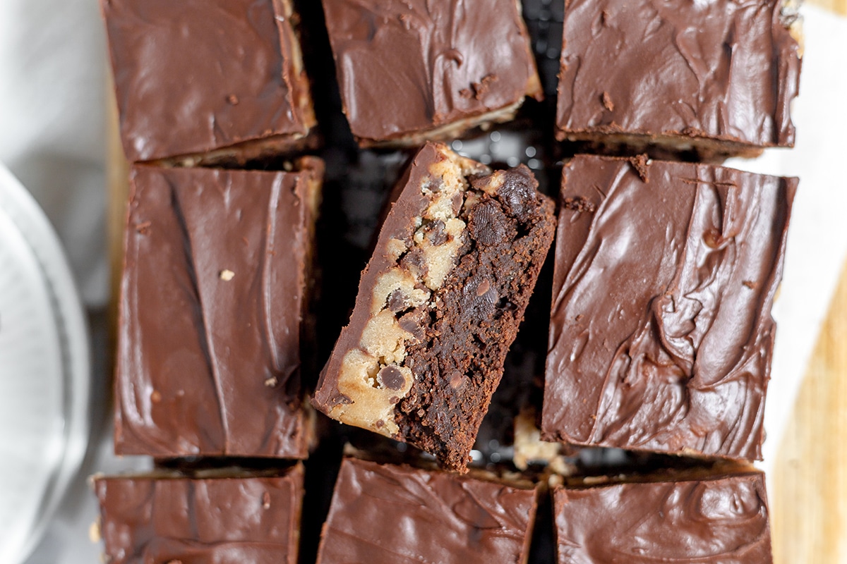 overhead shot of sliced brownies with cookie dough