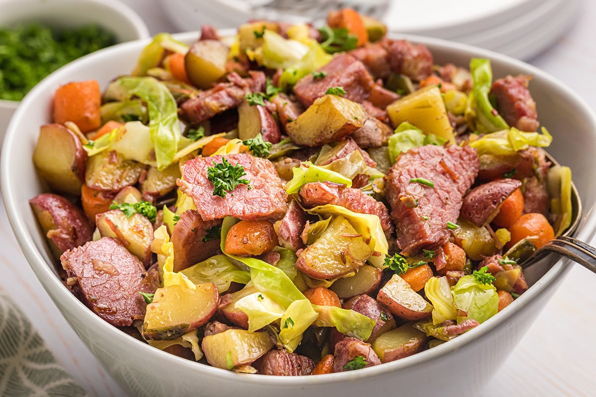 angled shot of corned beef hash in a serving bowl