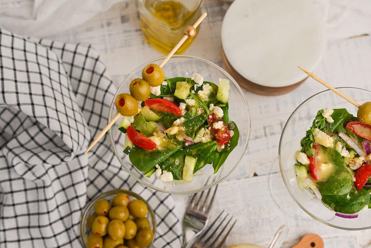 overhead shot of salad in martini glass