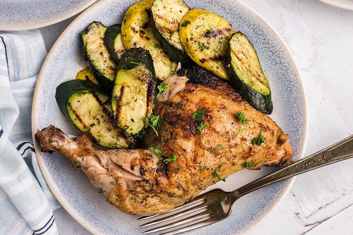overhead shot of plate of fireman chicken with zucchini