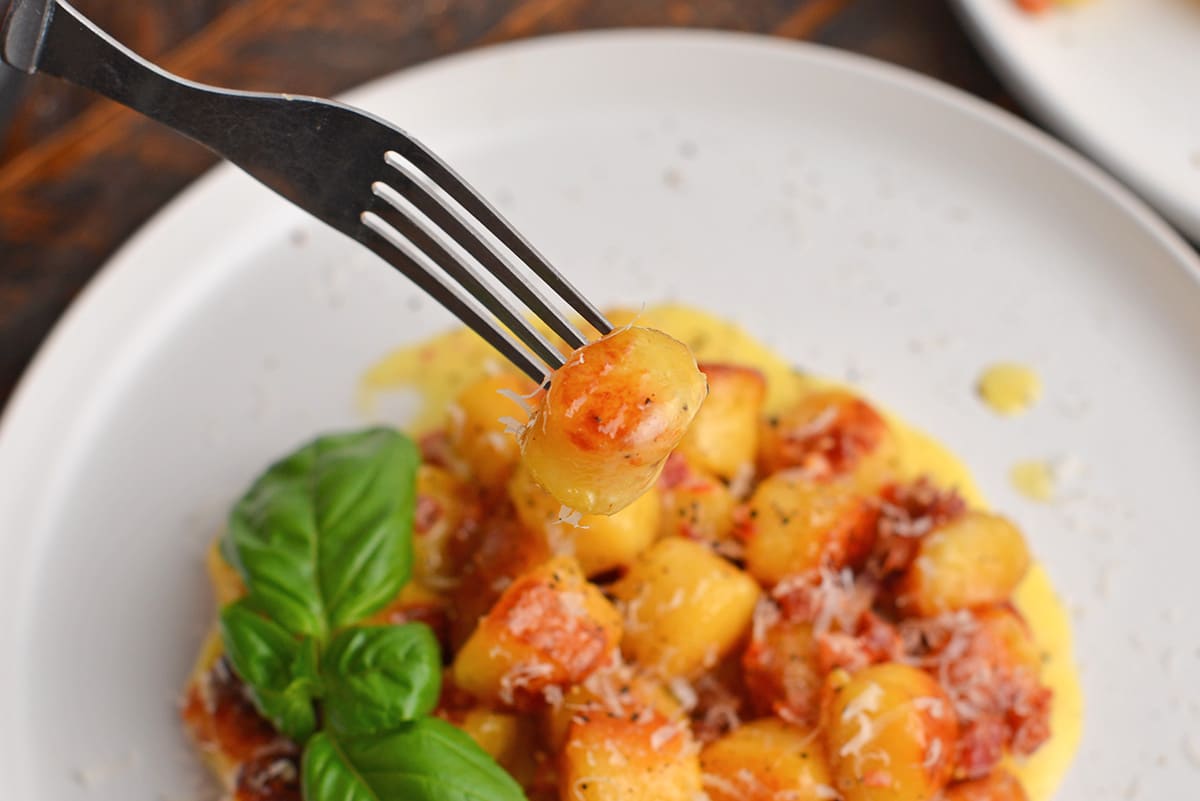 close up of gnocchi on a fork