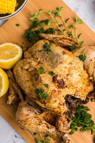 overhead shot of instant pot whole chicken on cutting board