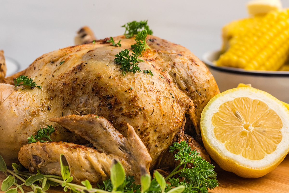 straight on shot of instant pot whole chicken on cutting board