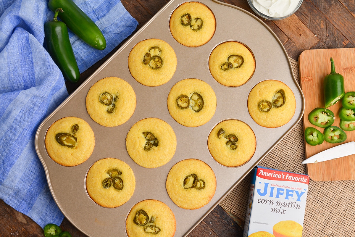 overhead shot of jalapeno cornbread muffins baked in a muffin tin