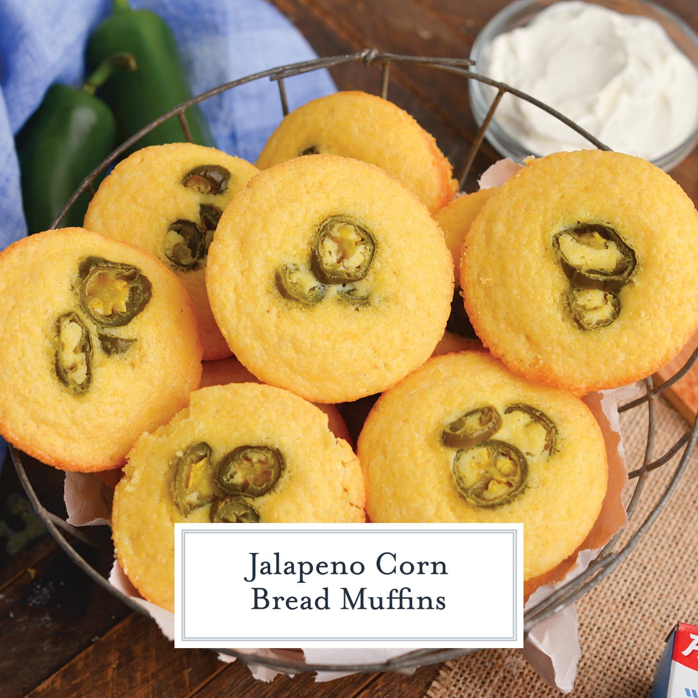 angled shot of basket of jalapeno cornbread muffins with text overlay for facebook