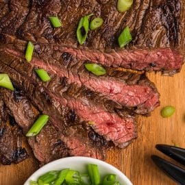 sliced skirt steak marinade on cutting board