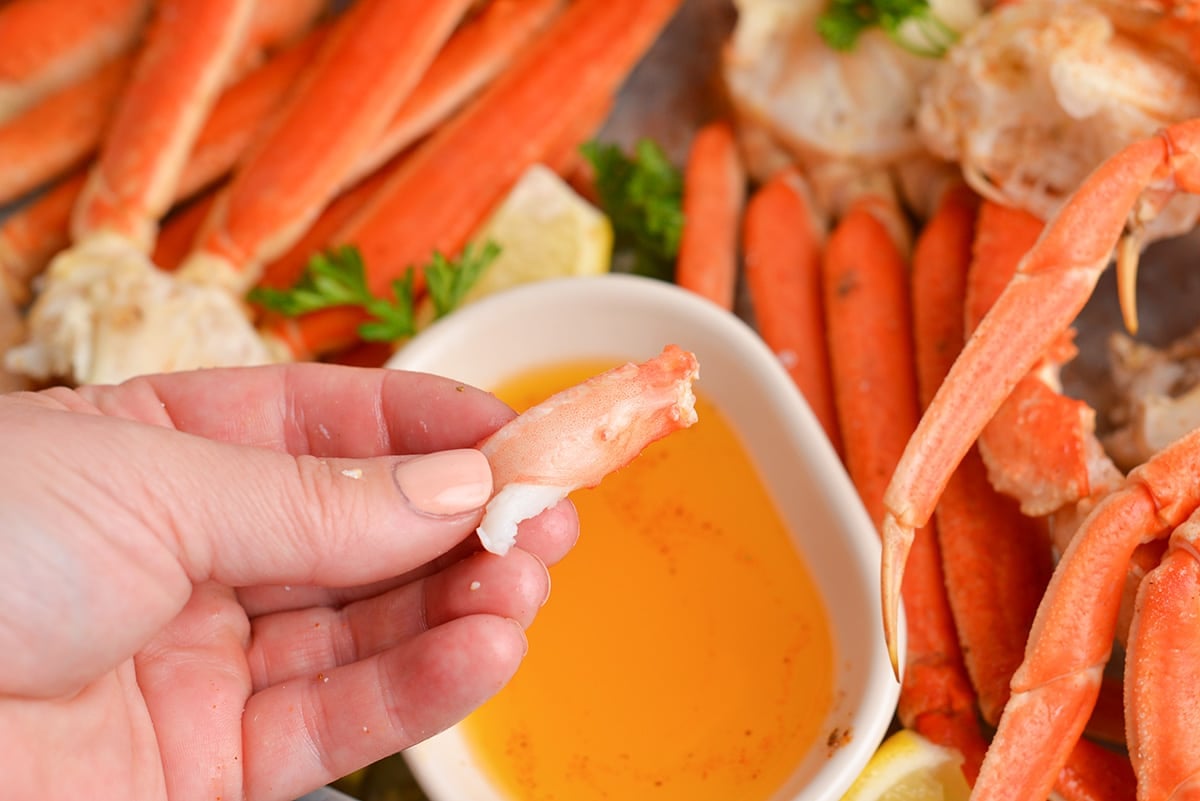 hand holding piece of crab meat