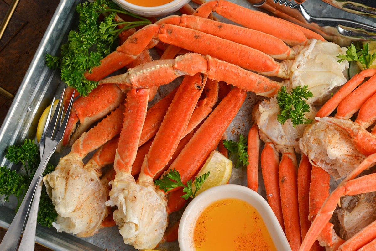 close up overhead shot of snow crab legs on a tray