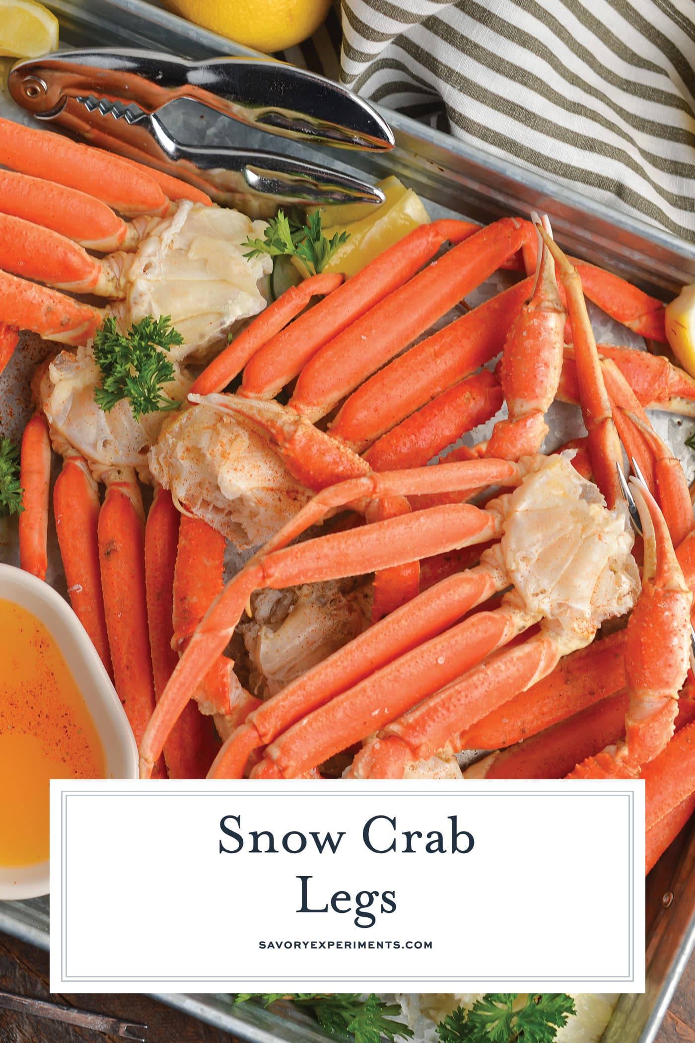 angled shot of snow crab legs with text overlay for pinterest