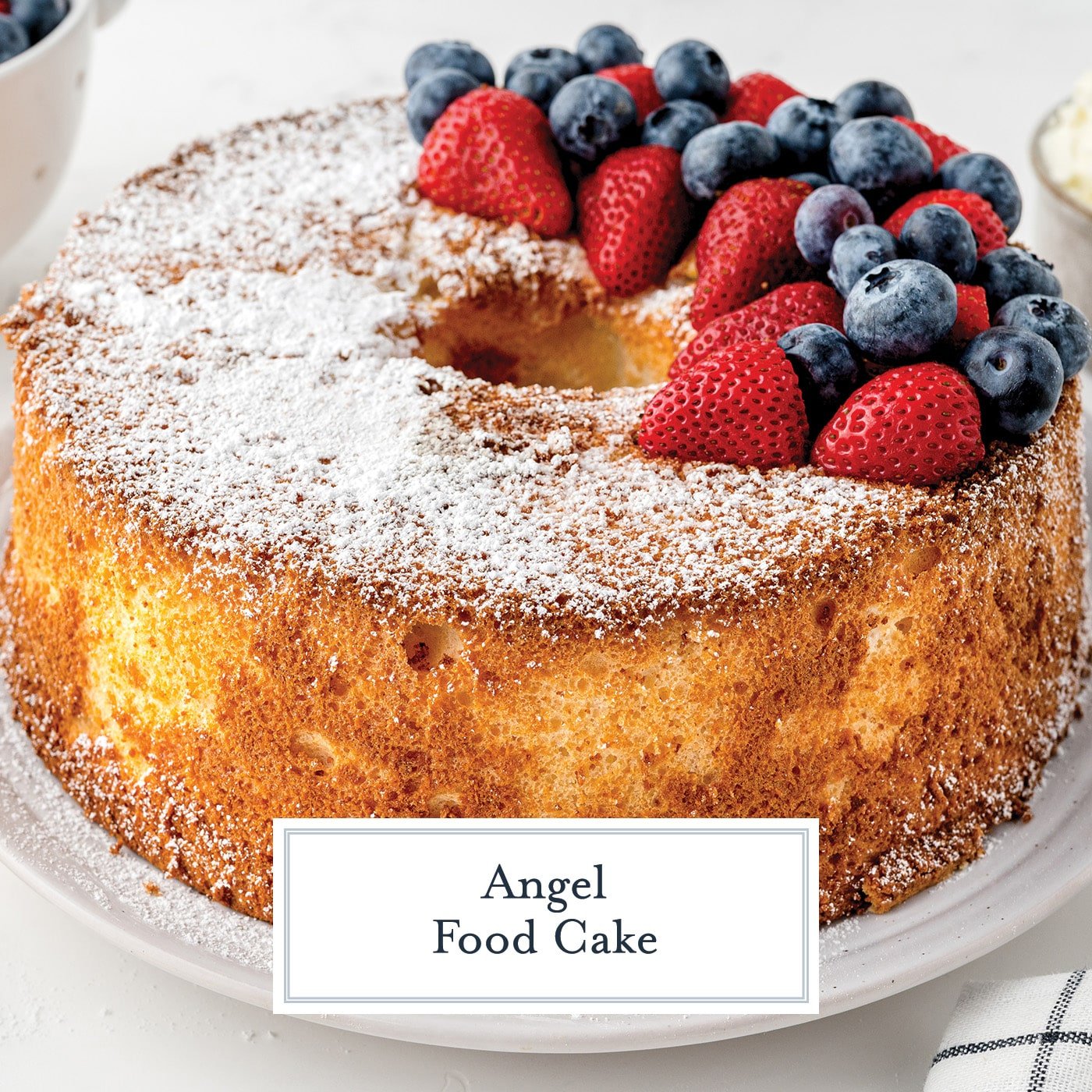 angle shot of angel food cake with text overlay for facebook