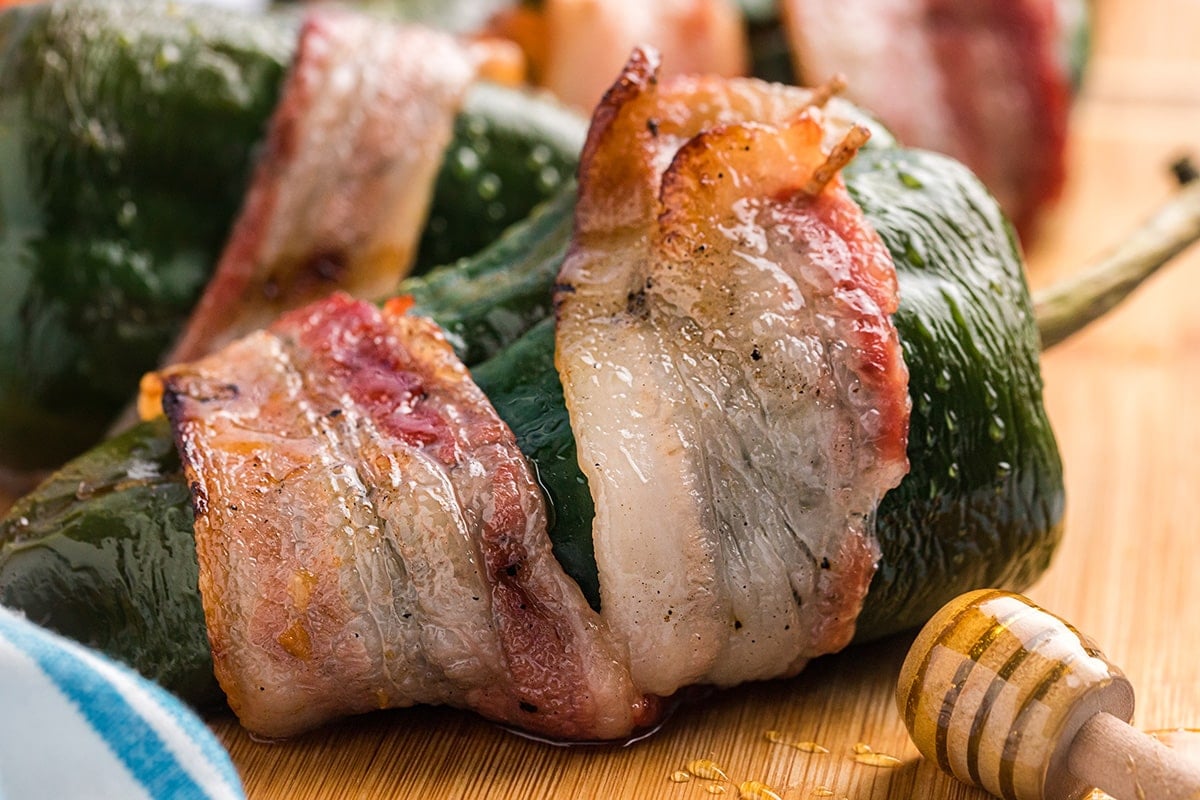 straight on close up shot of stuffed poblano peppers