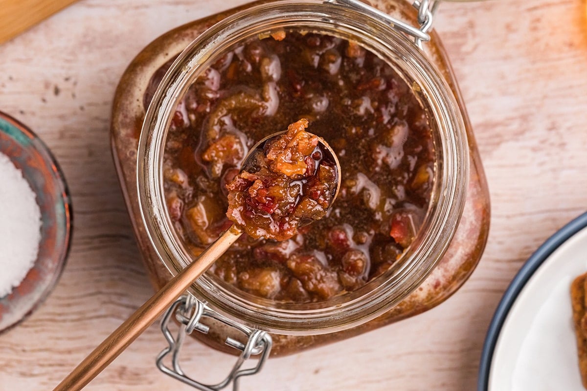 overhead shot of jar with spoon of bacon jam