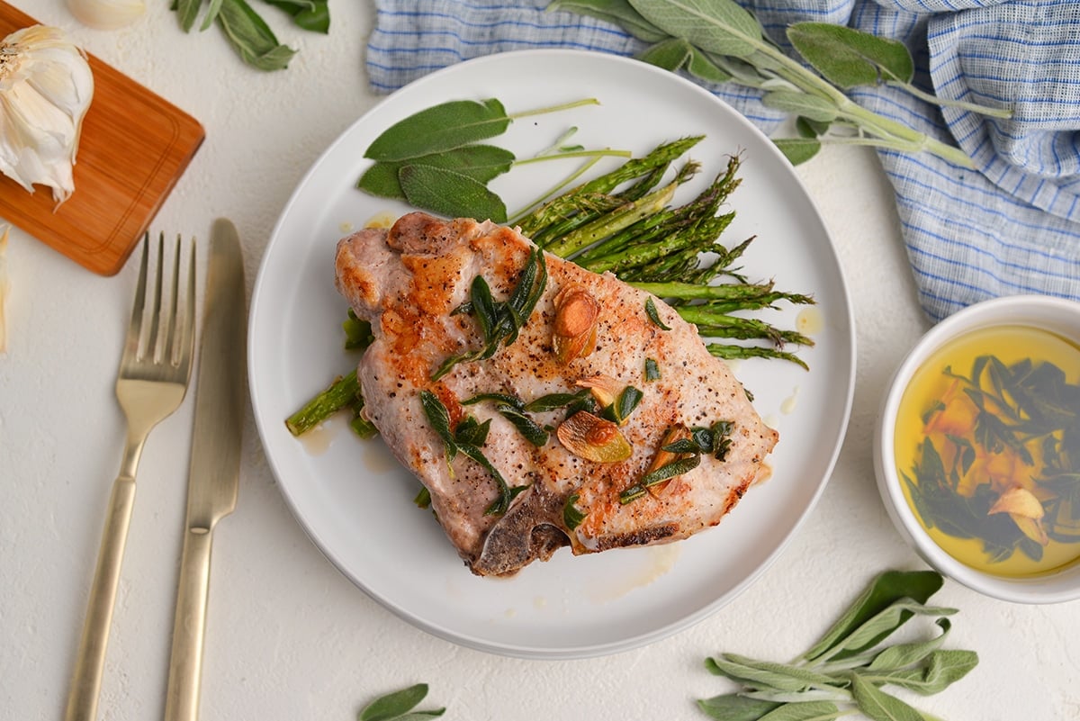 overhead plated pork chop with blue linen