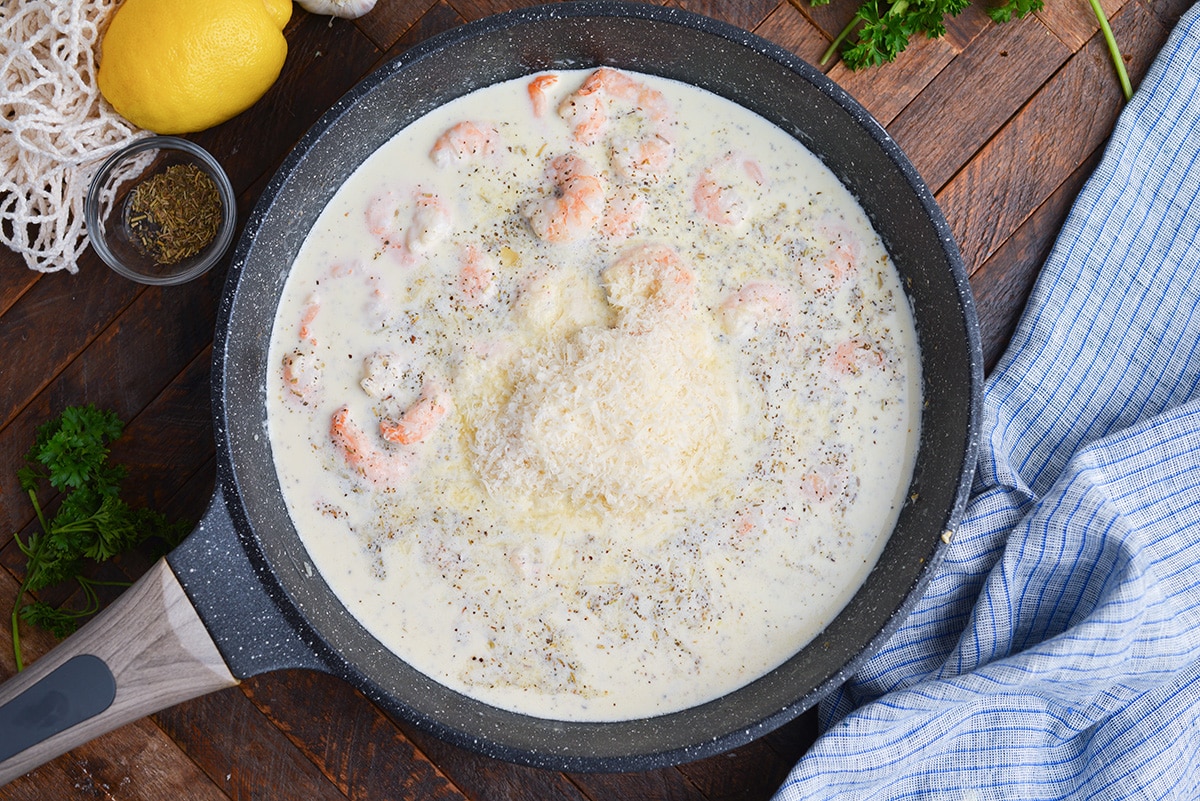 making a creamy scampi sauce in a skillet