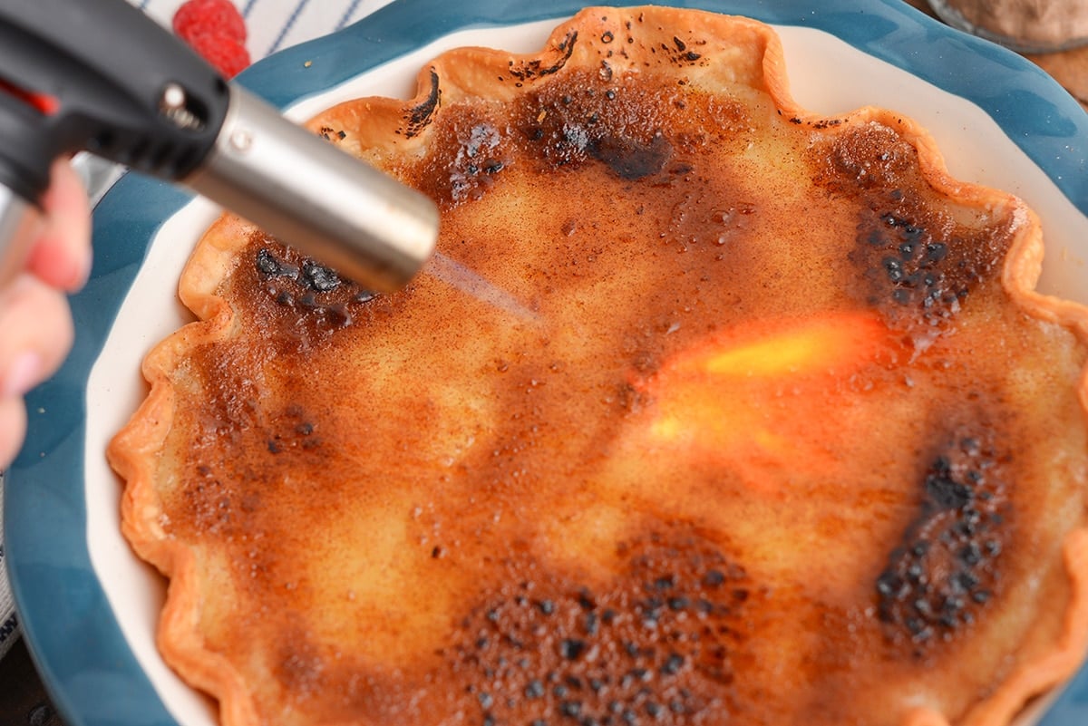 blow torch torching top of pie